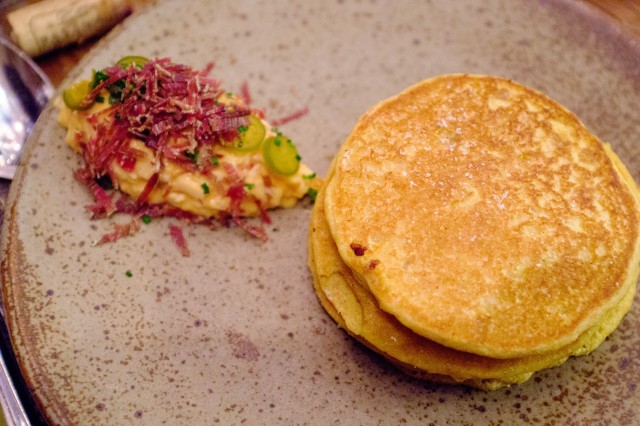 close up image of johnny cake on a plate 