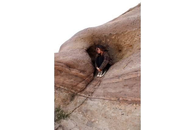 Person in rock formation