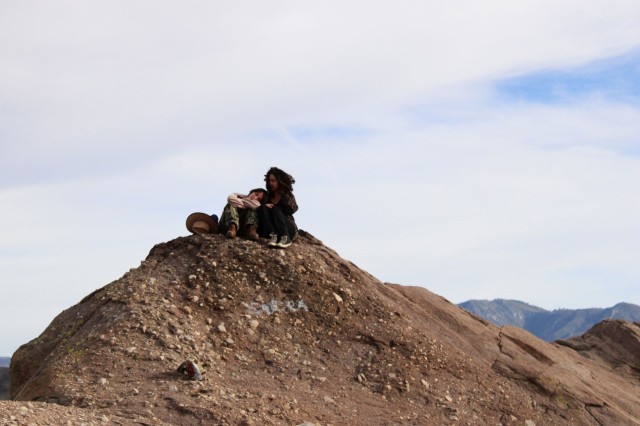 Person on top of rocks