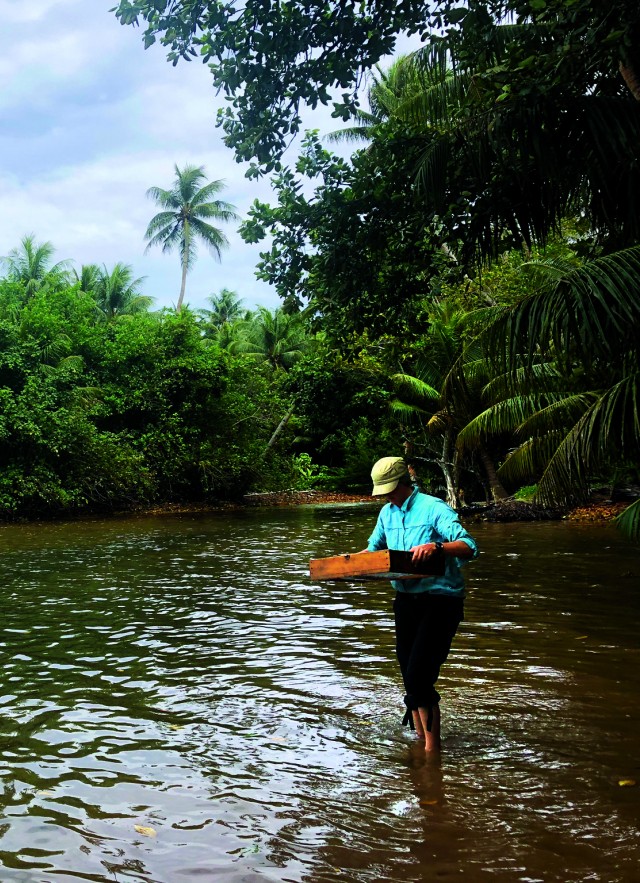 Amy Gusick doing field research in Micronesia