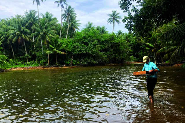 Amy Gusick doing field research in Micronesia