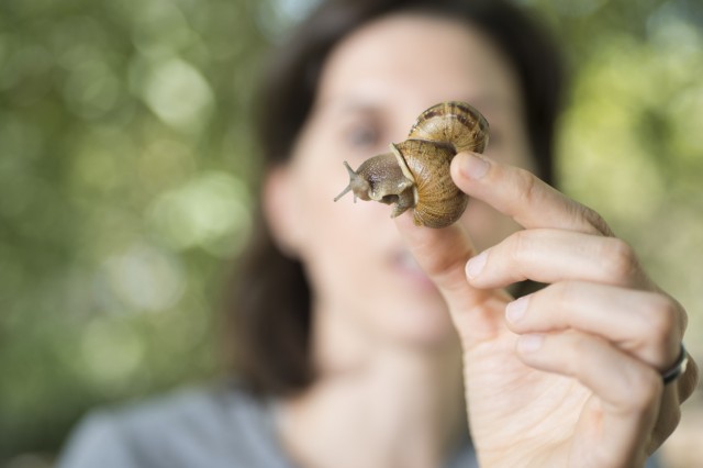 Close-up of Jann Vendetti holding a slug