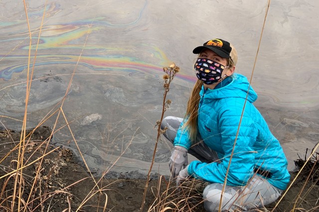 Researchers at the edge of a tar pit in Oklahoma