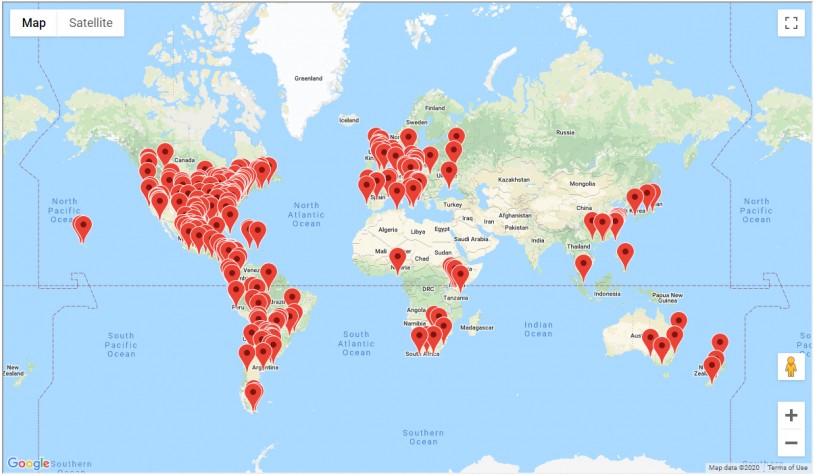 A world map with 244 red dots on 40 countries that signify where the CNC projects were in 2020..