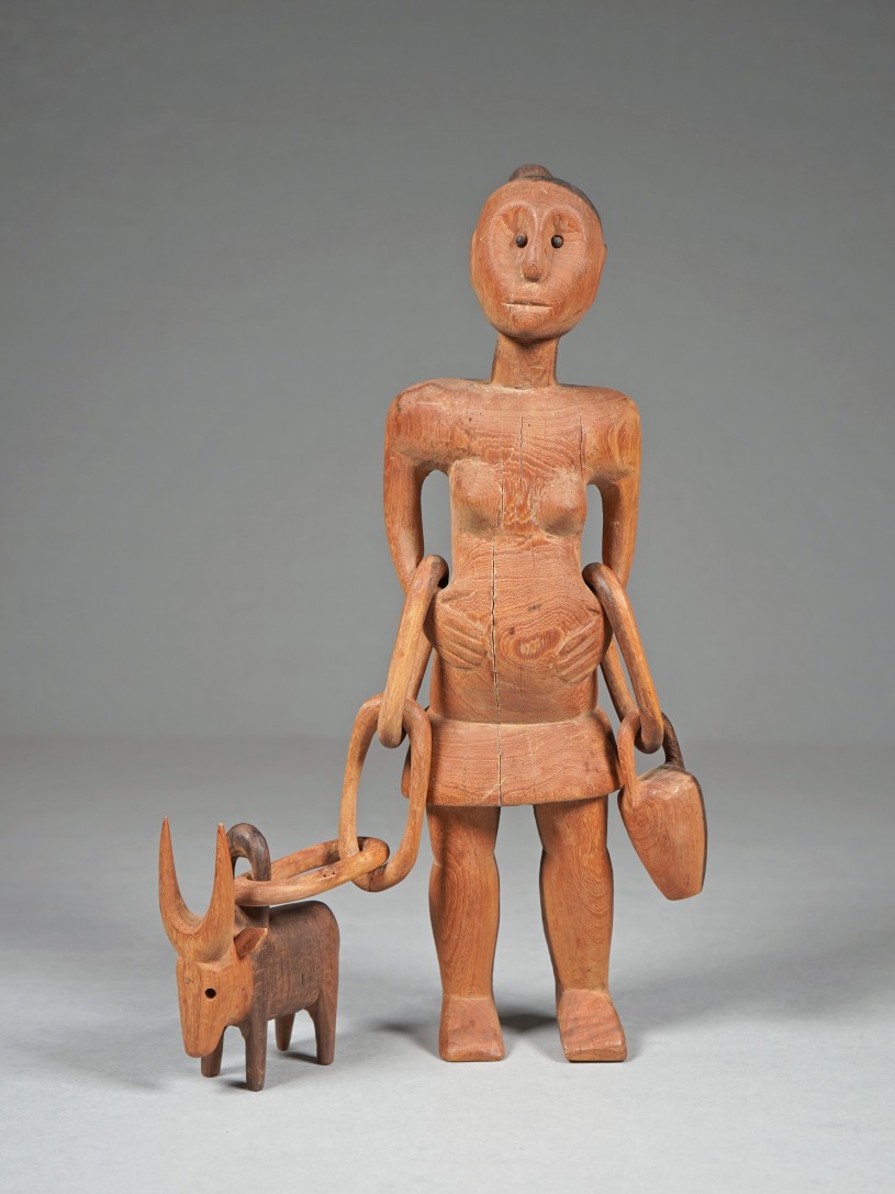 Woman with Ox Figurine