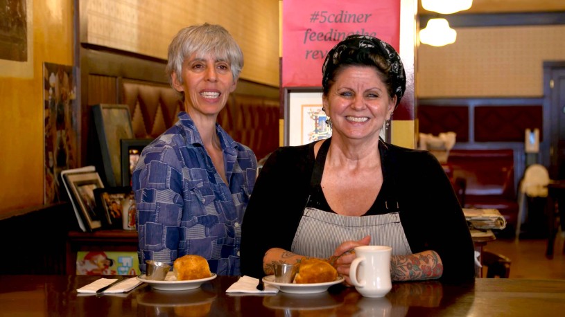 Two women sitting at table 