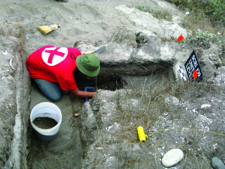 Amy Gusick excavating on near coast on Santa Cruz Island